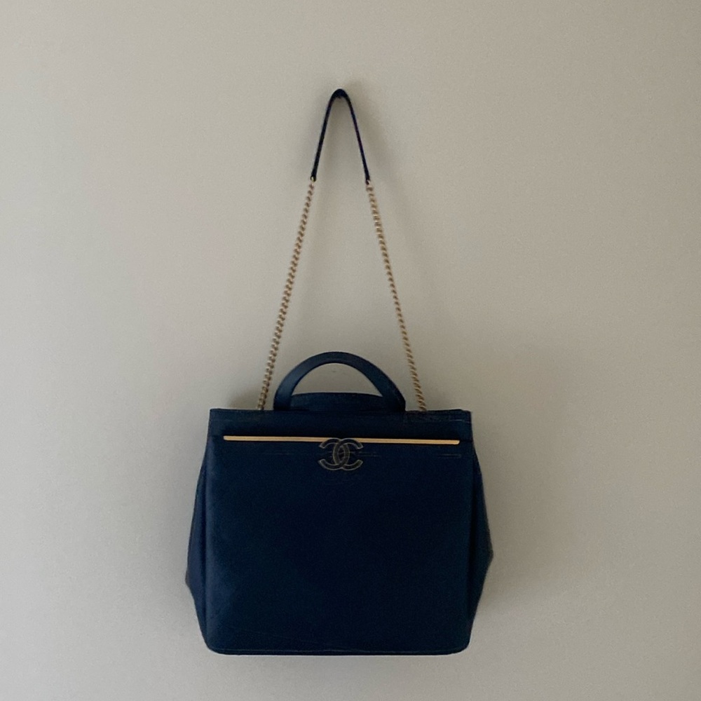Like NEW beautiful Chanel bag. Black with gold trim